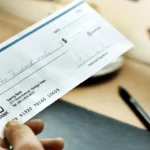 reception du cheque energie par une personne avec des revenus moyens dans son foyer fiscal